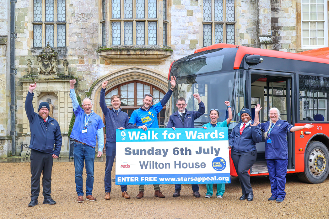 Photo of Salisbury Reds bus and Stars Appeal ambassadors