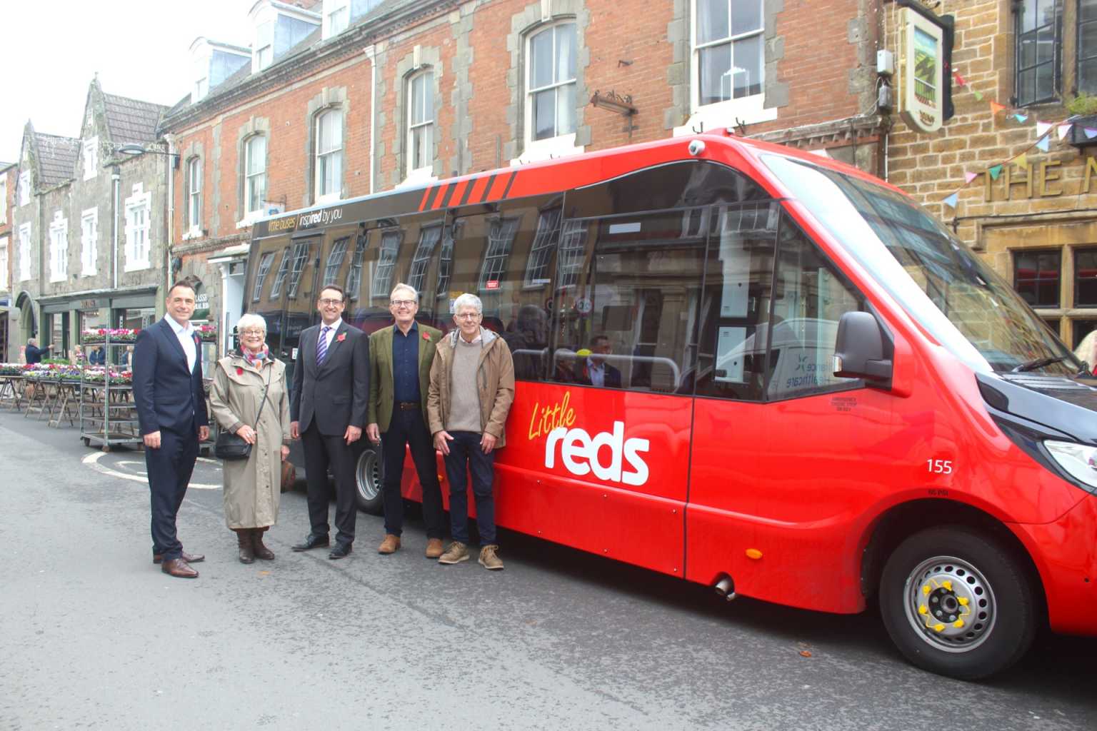 Photo of new Little Reds bus along with Salisbury Reds and Wiltshire Council representatives